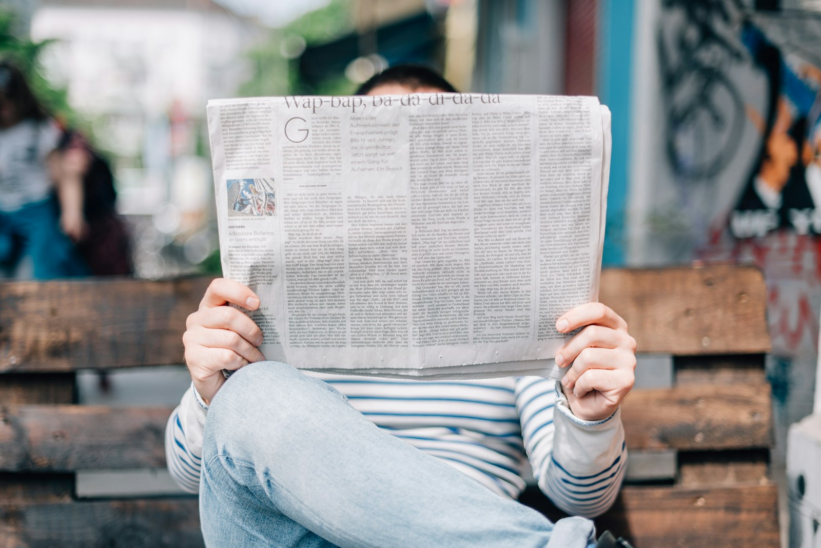 Illustrative newspaper reading image